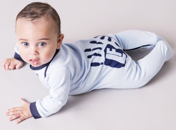Cotton baby grow,sky blue with navy hands.