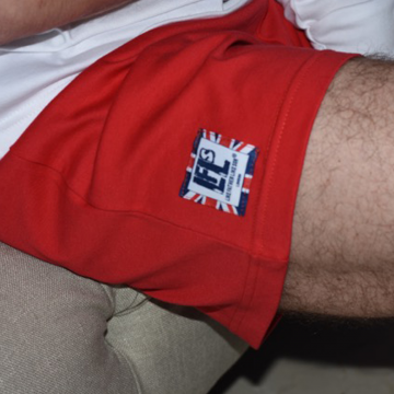 Mens white and red cotton pyjamas shorts and top football design.