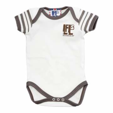 creamy white baby vest with lion cub design